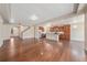 Spacious living room featuring hardwood floors and an open floor plan at 160 Pipit Lake Way, Erie, CO 80516