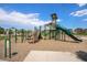 Community playground featuring climbing structures, slides, and a wood chip ground cover at 160 Pipit Lake Way, Erie, CO 80516