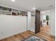 Bedroom with open closet design, white walls, and modern decor at 1640 E Virginia Ave, Denver, CO 80209