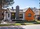 Charming single-Gathering home featuring unique design elements and meticulous landscaping in a suburban setting at 1640 E Virginia Ave, Denver, CO 80209