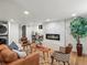 Cozy living room with modern fireplace, wood floors, and stylish decor at 1640 E Virginia Ave, Denver, CO 80209