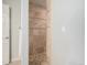 Tiled standing shower with mosaic floors at 19379 W 57Th Pl, Golden, CO 80403
