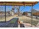 View of a backyard patio with a large picnic table and a spacious outdoor area at 1120 Holly St, Denver, CO 80220