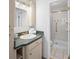 Cozy bathroom with modern fixtures, clean lines, and tiled shower at 1050 S Monaco Pkwy # 68, Denver, CO 80224
