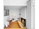 Cozy fireplace nook with built-in seating and inviting ambiance at 1050 S Monaco Pkwy # 68, Denver, CO 80224