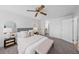 Serene main bedroom featuring neutral tones, soft carpet, and ample natural light at 1050 S Monaco Pkwy # 68, Denver, CO 80224
