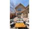 Cozy patio with stone flooring, outdoor seating, and grill, perfect for entertaining or relaxing at 2042 S Clayton St, Denver, CO 80210