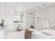 Modern bathroom with soaking tub and walk-in shower at 3048 Stout St, Denver, CO 80205