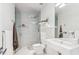 Clean bathroom with walk-in shower and modern vanity at 3048 Stout St, Denver, CO 80205