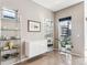 Bright dining area with sleek shelving and glass-front cabinets at 3048 Stout St, Denver, CO 80205