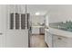 Well-lit, functional kitchen with stainless steel appliances and ample storage, conveniently laid out for meal preparation at 9790 E 5Th Ave, Aurora, CO 80010