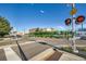 A street view featuring a commuter train, street, and buildings in the background at 14221 E 1St Dr # 303, Aurora, CO 80011