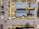 An aerial view shows this property's roof, landscaping, and neighborhood, with bike lanes in the street at 3504 Newton St, Denver, CO 80211