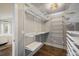 Custom walk-in closet with built-in shelving and ample storage space at 3504 Newton St, Denver, CO 80211