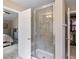 Bright bathroom featuring walk-in shower and a view into the main bedroom and walk in closet at 20855 Park Hollow Dr, Parker, CO 80138