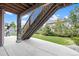 Spacious patio area with visible under-decking structure and landscaping at 20855 Park Hollow Dr, Parker, CO 80138