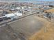 Bird's-eye view highlighting access to nearby municipal buildings and water tower in a growing community at 724 County Road 37, Brighton, CO 80603