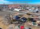 Aerial view of a commercial property with office/drive-thru near Lochbuie Town Hall and Hudson Fire Protection at 724 County Road 37, Brighton, CO 80603