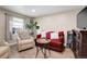 Cozy living room featuring hardwood floors and a comfortable seating area at 724 County Road 37, Brighton, CO 80603