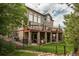 Expansive home exterior featuring a spacious deck and patio with backyard access at 171 October Pl, Castle Rock, CO 80104