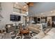 Open-concept living room and kitchen with great natural light and modern decor at 171 October Pl, Castle Rock, CO 80104