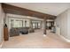 Spacious living room features an open floorplan, neutral colors, and large windows at 171 October Pl, Castle Rock, CO 80104