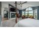 This main bedroom has a fireplace, sitting area, and stunning views at 171 October Pl, Castle Rock, CO 80104