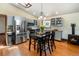 Bright kitchen featuring stainless steel appliances, wood countertops, and a dining table with seating at 4805 S Blue Spruce Rd, Evergreen, CO 80439