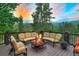 Inviting outdoor deck featuring comfortable seating and a cozy fire pit, perfect for relaxation at 805 Highfield Trl, Breckenridge, CO 80424