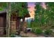 Charming home front with stone accents, timber details, and mountain views in the background at 805 Highfield Trl, Breckenridge, CO 80424