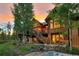 Lovely backyard featuring a spacious deck, hot tub, and beautiful views at 805 Highfield Trl, Breckenridge, CO 80424
