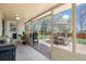 Covered patio with an outdoor kitchen and sliding glass doors leading to the backyard at 7960 Estes Ct, Arvada, CO 80005