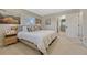 Spacious bedroom with an ensuite bathroom and walk-in closet at 3680 S Glencoe St, Denver, CO 80237