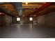 Spacious unfinished basement offers ample room for storage or future renovation and personalization at 40477 Ferns Rd, Elizabeth, CO 80107