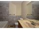 Bathroom featuring a bath, toilet, sink, and a large mirror at 40477 Ferns Rd, Elizabeth, CO 80107