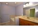 Bathroom featuring a bath, sink, and a large mirror at 40477 Ferns Rd, Elizabeth, CO 80107