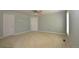 Neutral carpet and paint create a blank slate in this airy bedroom at 40477 Ferns Rd, Elizabeth, CO 80107