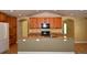 Spacious kitchen featuring a large island, granite countertops, and stainless steel appliances at 40477 Ferns Rd, Elizabeth, CO 80107