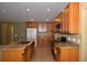 Open kitchen boasts granite countertops, ample cabinet space, and modern appliances at 40477 Ferns Rd, Elizabeth, CO 80107
