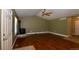 Inviting living room boasts hardwood floors, vaulted ceilings, and a warm stove at 40477 Ferns Rd, Elizabeth, CO 80107