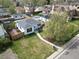 Aerial view of a suburban home showcasing its backyard, neighboring houses, and landscaping at 1615 S Elizabeth St, Denver, CO 80210