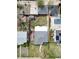Bird's-eye view of a suburban home showcasing its backyard, neighboring houses, and landscaping at 1615 S Elizabeth St, Denver, CO 80210