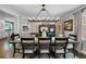 Elegant dining room features a modern chandelier and stylish decor at 11453 E Orchard Pl, Englewood, CO 80111