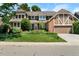 Charming two-story home with well-maintained landscaping and a two-car garage at 11453 E Orchard Pl, Englewood, CO 80111