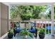 Cozy outdoor patio featuring comfortable seating and surrounded by lush greenery at 11453 E Orchard Pl, Englewood, CO 80111