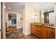 Bathroom featuring double vanity with plenty of storage, and an adjacent closet at 1411 Wynkoop St # 804, Denver, CO 80202