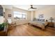 Bedroom with a large window overlooking the city and hardwood floors at 1411 Wynkoop St # 804, Denver, CO 80202