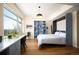 Comfortable bedroom with a built-in bed, work space, and ample natural light, perfect for relaxation at 1411 Wynkoop St # 804, Denver, CO 80202