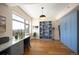 Bright bedroom with a large window, built-in storage, and hardwood floors, perfect for a home office at 1411 Wynkoop St # 804, Denver, CO 80202