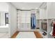 Spacious walk-in closet with custom shelving, drawers, and ample storage for clothing and accessories at 220 Glencoe St, Denver, CO 80220